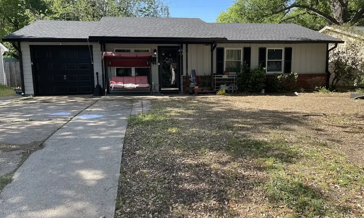 Asphalt Shingle Roof Repair crew at work on a residential roof in McDonough